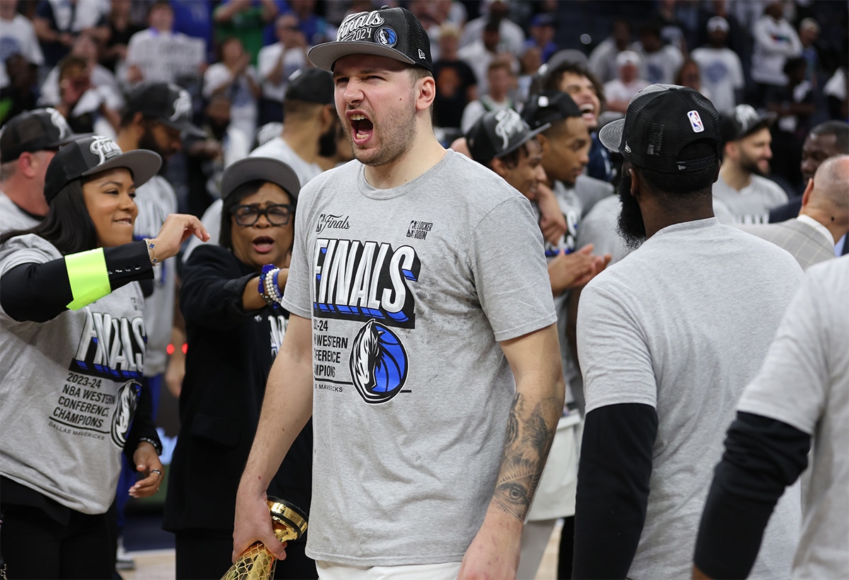 Dallas Mavericks guard Luka Doncic (77) celebrates after winning the Western Confrerence Championship against the Minnesota Timberwolves in game five of the western conference finals for the 2024 NBA playoffs at Target Center.