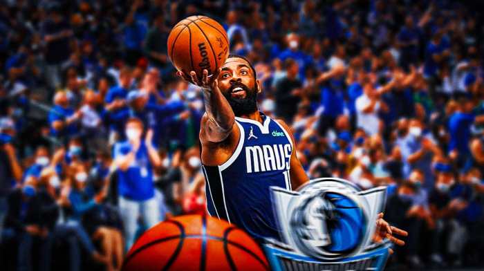 Dallas Mavericks guard Kyrie Irving scoring, while fans cheer.