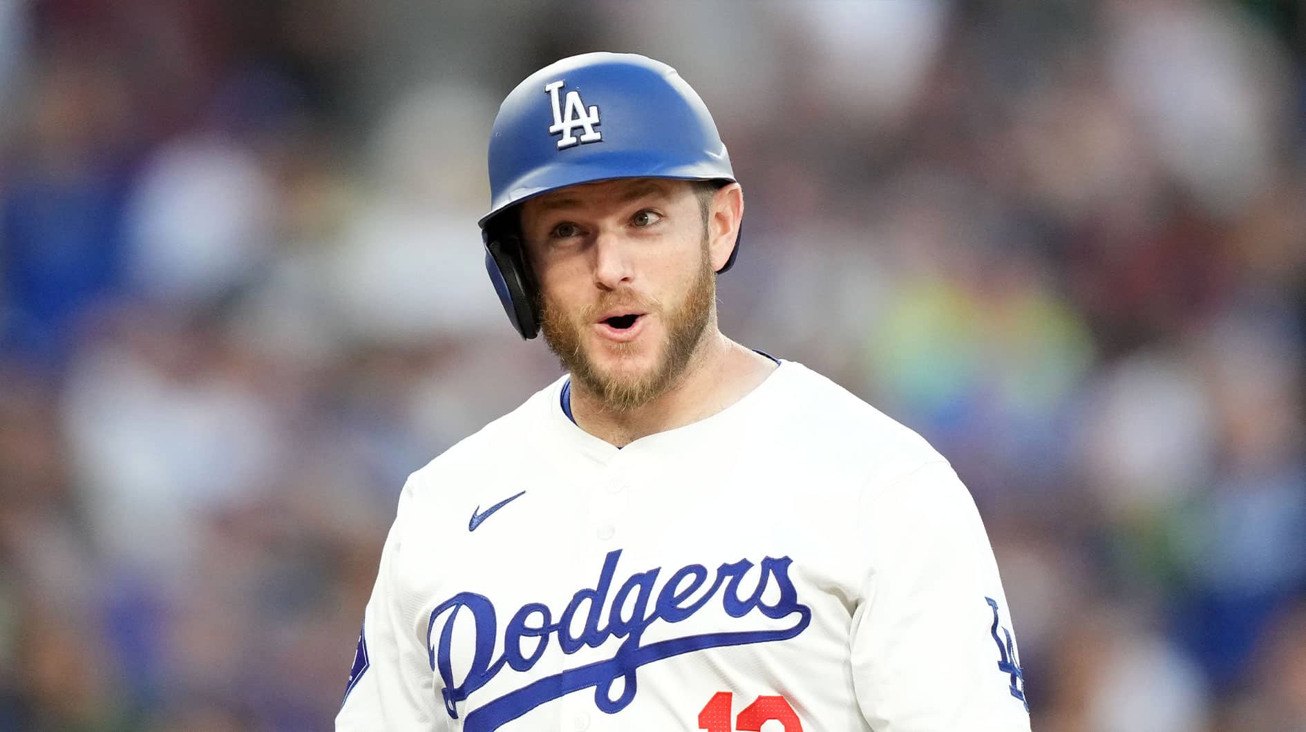 Los Angeles Dodgers third baseman Max Muncy (13) celebrates after hitting a grand slam in the first inning against the Miami Marlins at Dodger Stadium.