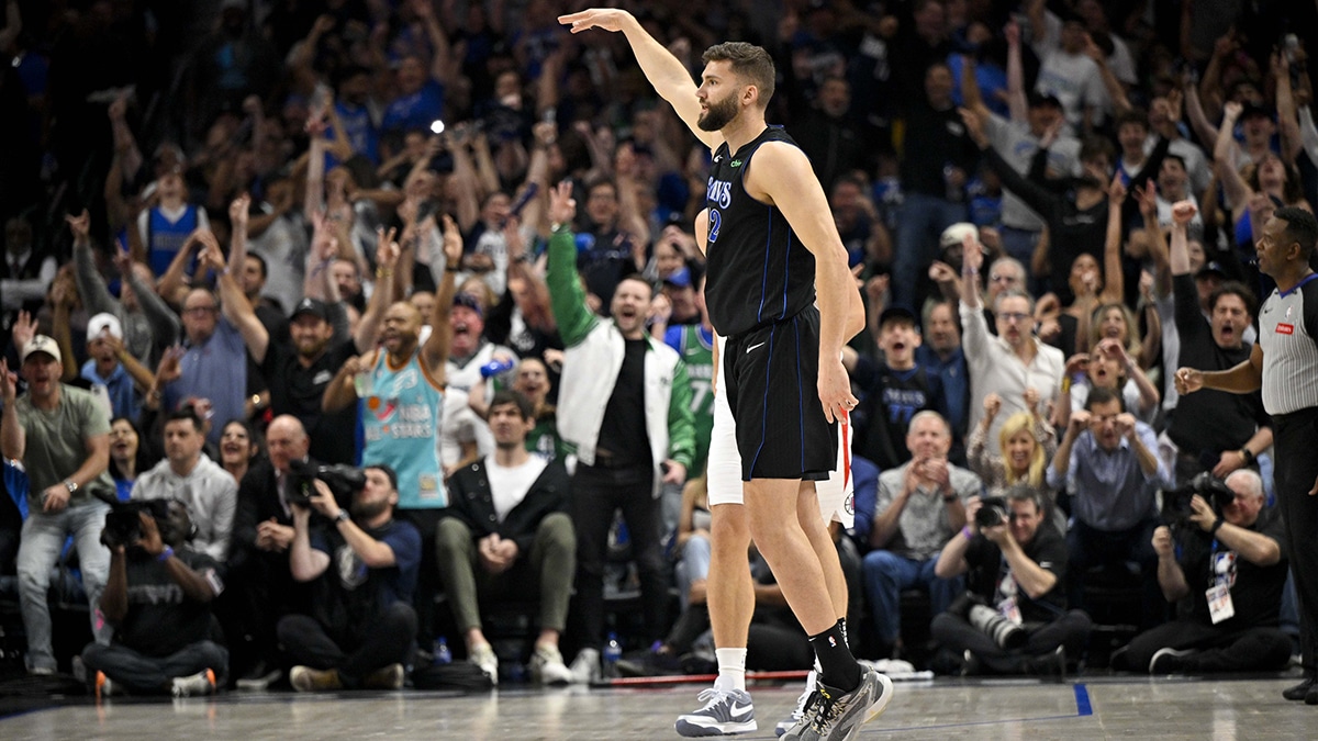 Dallas Mavericks forward Maxi Kleber (42) celebrates after making a three point shot against the LA Clippers during the first quarter during game six of the first round for the 2024 NBA playoffs at American Airlines Center. 