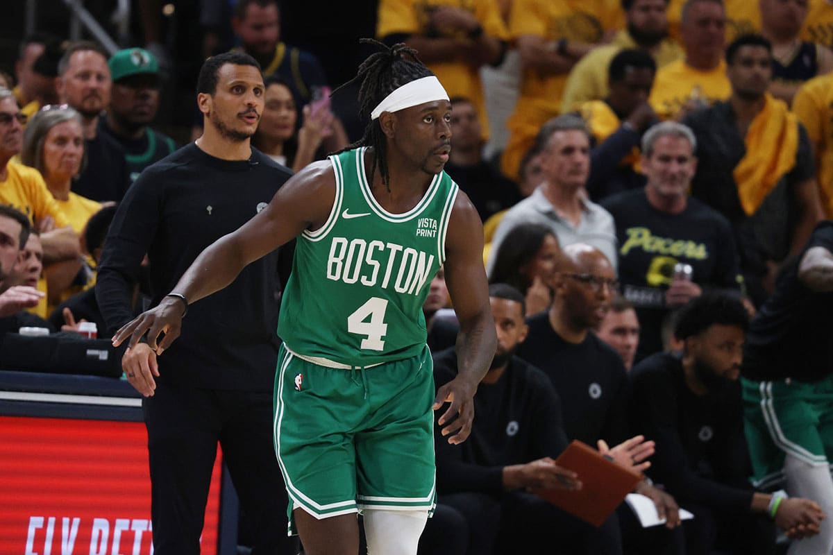 Boston Celtics guard Jrue Holiday (4) reacts in front of head coach Joe Mazzulla during the second quarter of game three of the eastern conference finals against the Indiana Pacers in the 2024 NBA playoffs at Gainbridge Fieldhouse.