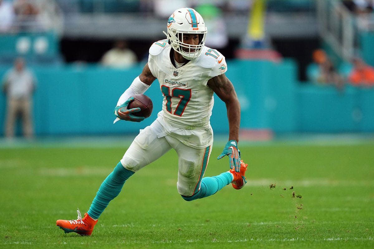 Miami Dolphins wide receiver Jaylen Waddle (17) runs with the ball against the New York Jets during the second half at Hard Rock Stadium. 