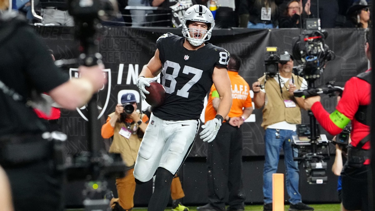 Las Vegas Raiders tight end Michael Mayer (87) celebrates after scoring a touchdown in the second quarter against the Los Angeles Chargers at Allegiant Stadium.