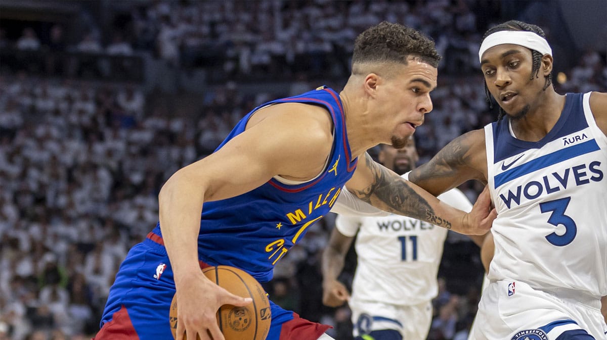 Denver Nuggets forward Michael Porter Jr. (1) drives to the basket against the Minnesota Timberwolves in the first half during game three of the second round for the 2024 NBA playoffs at Target Center. 
