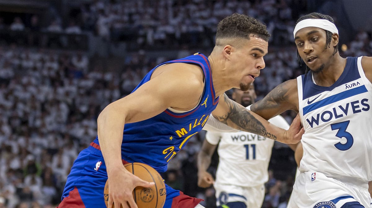 Denver Nuggets forward Michael Porter Jr. (1) drives to the basket against the Minnesota Timberwolves in the first half during game three of the second round for the 2024 NBA playoffs at Target Center.
