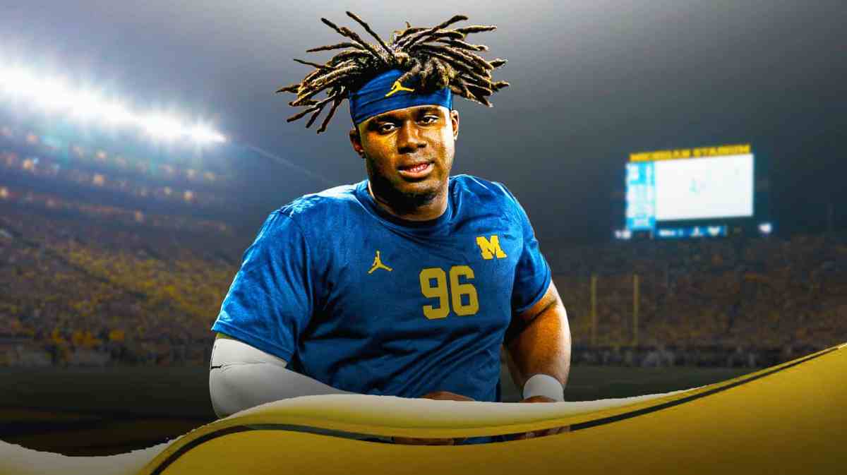 Enow Etta, Michigan football, Wolverines, Enow Etta Michigan, Michigan football spring game, Enow Etta in Michigan uni with Michigan football stadium in the background