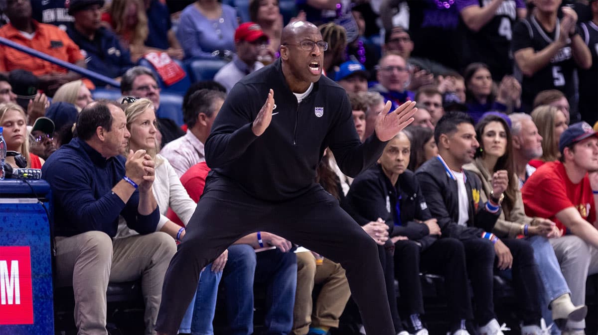 Sacramento Kings head coach Mike Brown gives direction against the New Orleans Pelicans in the first half during a play-in game of the 2024 NBA playoffs at Smoothie King Center.