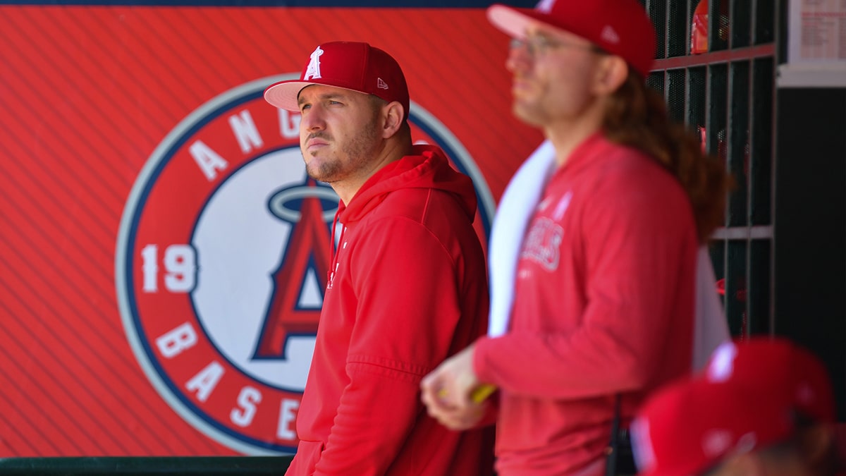  Los Angeles Angels center fielder Mike Trout (27) watches game action against the Kansas City Royals during the first inning at Angel Stadium.