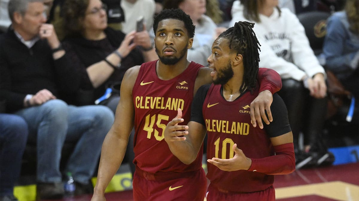 Cleveland Cavaliers guard Donovan Mitchell (45) and guard Darius Garland (10) talk in the fourth quarter against the Indiana Pacers at Rocket Mortgage FieldHouse.