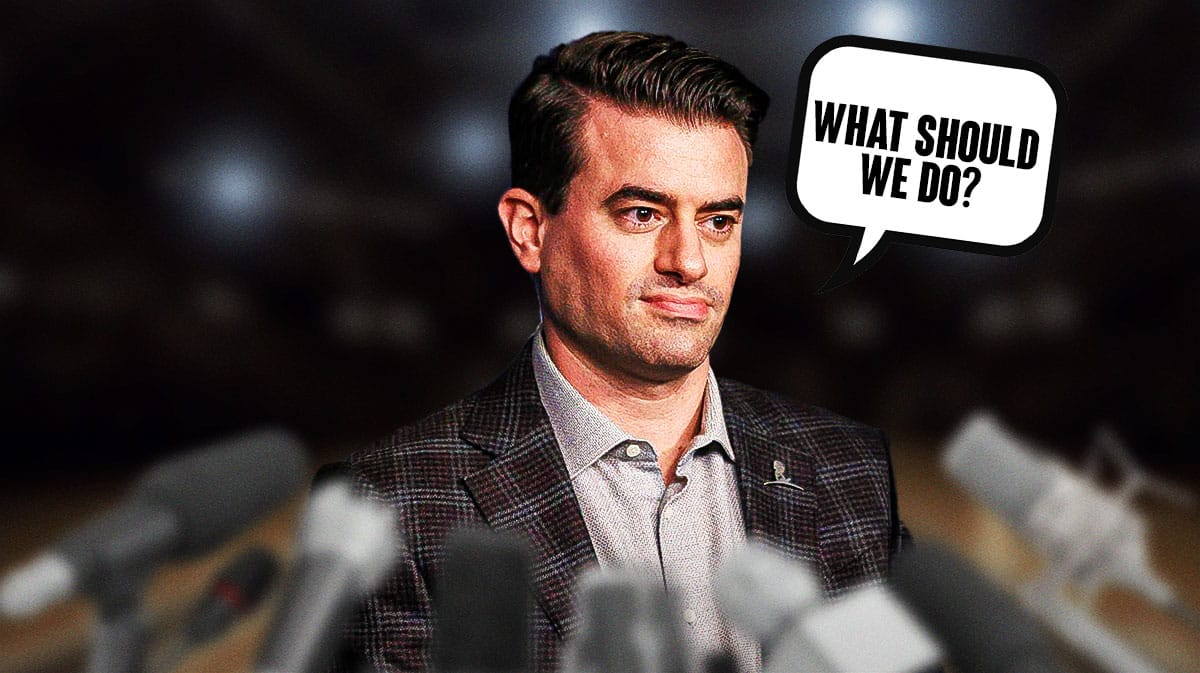 Grizzlies general manager Zach Kleiman thinks to himself "what should we do?" (thought bubble).