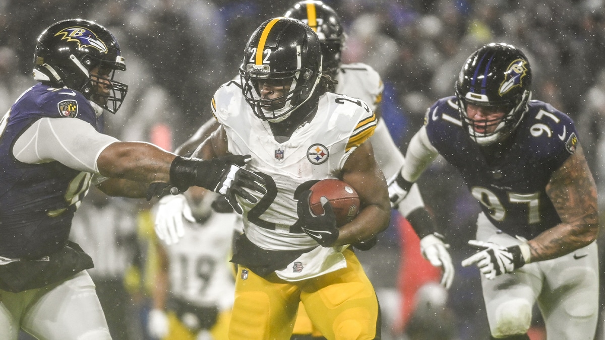 Pittsburgh Steelers running back Najee Harris (22) rushes as Baltimore Ravens defensive tackle Justin Madubuike (92) defends during the first half at M&T Bank Stadium.
