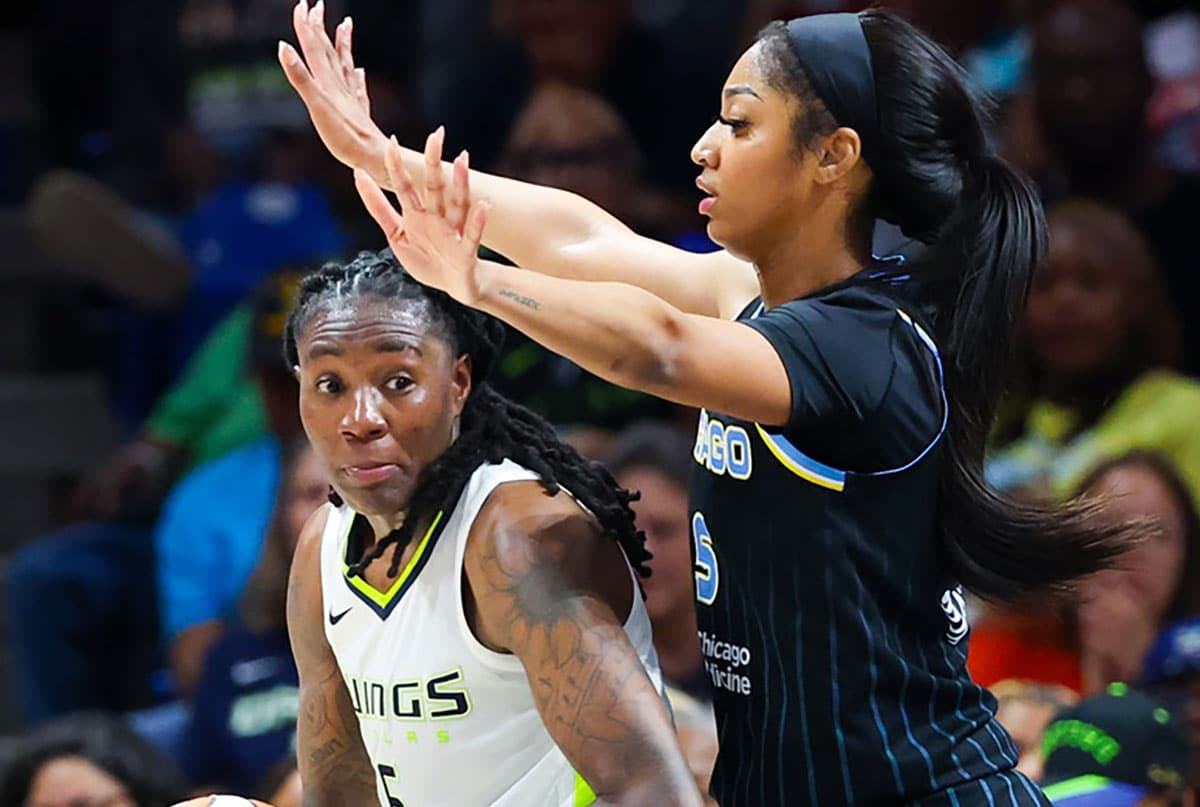 Dallas Wings forward Natasha Howard (6) looks to score as Chicago Sky forward Angel Reese (5) defends during the second half at College Park Center. 