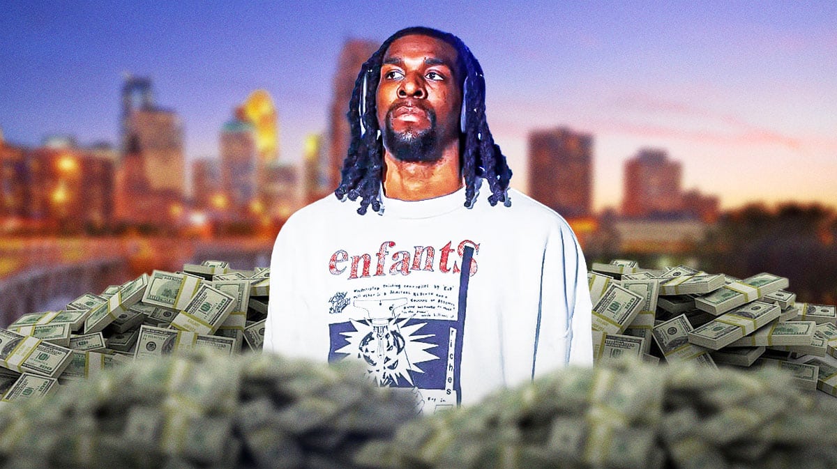 Naz Reid surrounded by piles of cash.