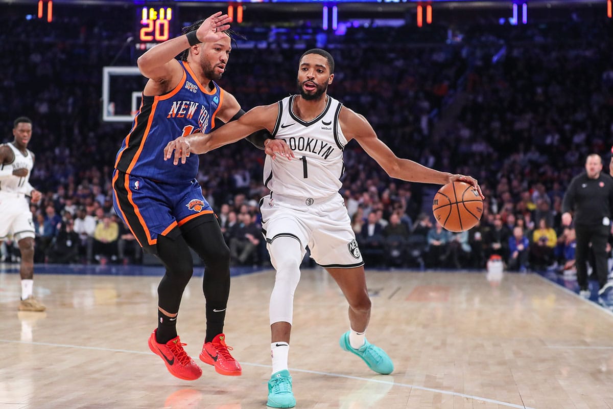 Brooklyn Nets forward Mikal Bridges (1) looks to drive past New York Knicks guard Jalen Brunson (11) in the first quarter at Madison Square Garden.