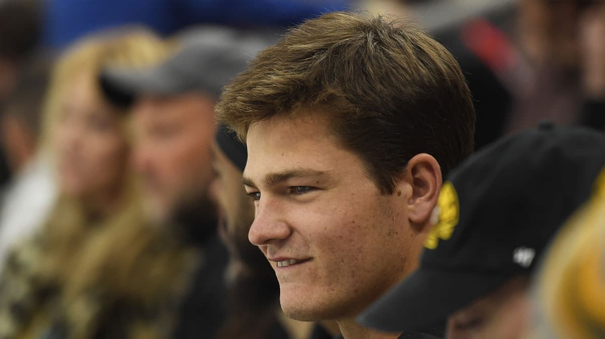 New England Patriots rookie quarterback Drake Maye watches the Boston Bruins and Florida Panthers during the first period in game four of the second round of the 2024 Stanley Cup Playoffs