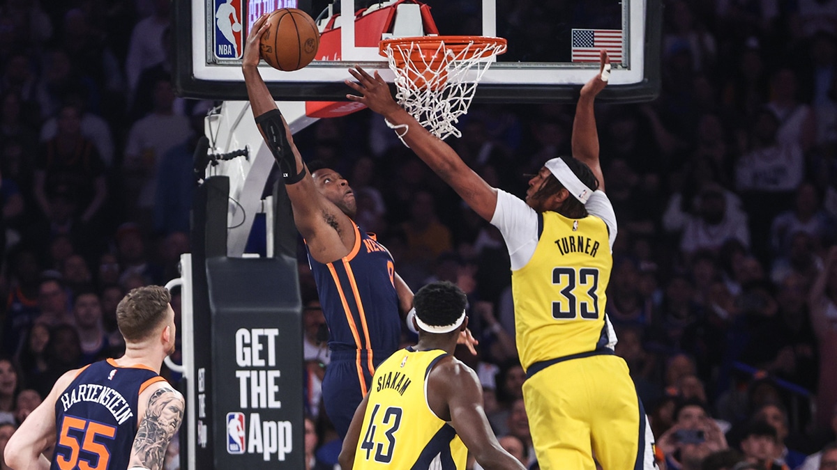 May 8, 2024; New York, New York, USA; New York Knicks forward OG Anunoby (8) attempts to dunk past Indiana Pacers center Myles Turner (33) in the first quarter during game two of the second round for the 2024 NBA playoffs at Madison Square Garden. Mandatory Credit: Wendell Cruz-USA TODAY Sports