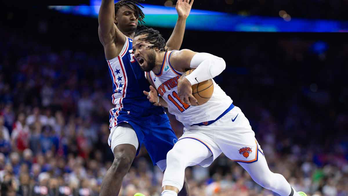 May 2, 2024; Philadelphia, Pennsylvania, USA; New York Knicks guard Jalen Brunson (11) drives against Philadelphia 76ers guard Tyrese Maxey (0) during the first half of game six of the first round for the 2024 NBA playoffs at Wells Fargo Center. Mandatory Credit: Bill Streicher-USA TODAY Sports