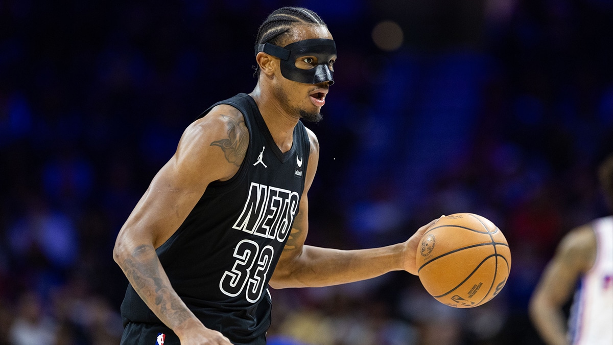 Brooklyn Nets center Nic Claxton (33) dribbles the ball against the Philadelphia 76ers during the first quarter at Wells Fargo Center.