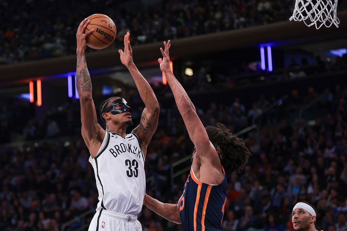 Brooklyn Nets center Nic Claxton (33) drives for a shot during the first half against New York Knicks center Jericho Sims (45) at Madison Square Garden.