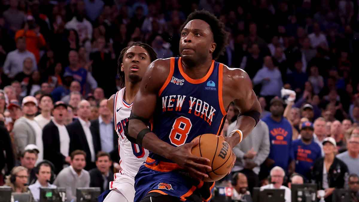 New York Knicks forward OG Anunoby (8) drives to the basket against Philadelphia 76ers guard Tyrese Maxey (0) during the fourth quarter of game 5 of the first round of the 2024 NBA playoffs at Madison Square Garden.