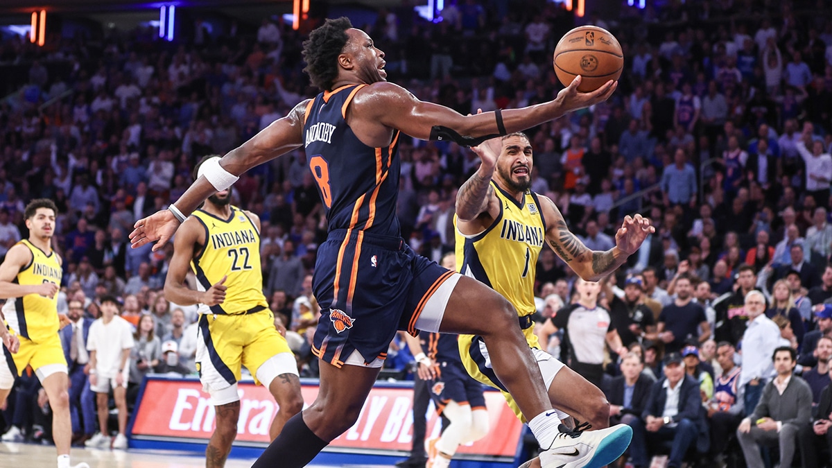 New York Knicks forward OG Anunoby (8) drives past Indiana Pacers forward Obi Toppin (1) in the third quarter during game two of the second round for the 2024 NBA playoffs at Madison Square Garden. 