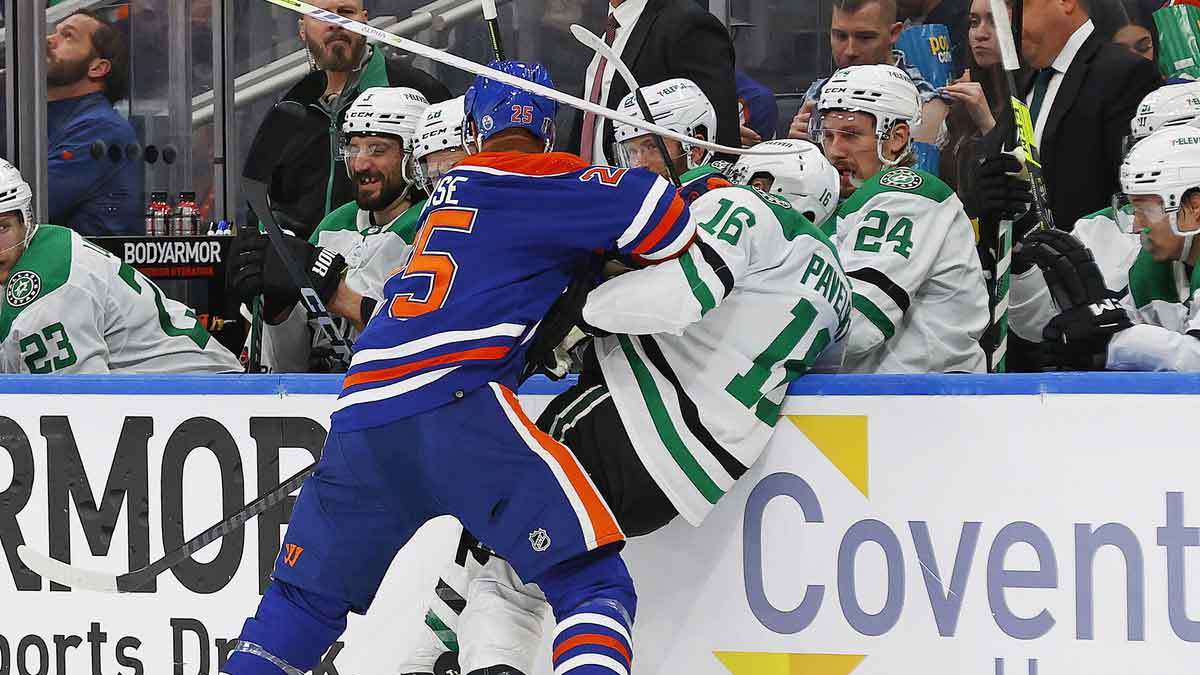 Edmonton Oilers defensemen Darnell Nurse (25) checks Dallas Stars forward Joe Pavelski (16) during the second period in game four of the Western Conference Final of the 2024 Stanley Cup Playoffs at Rogers Place.
