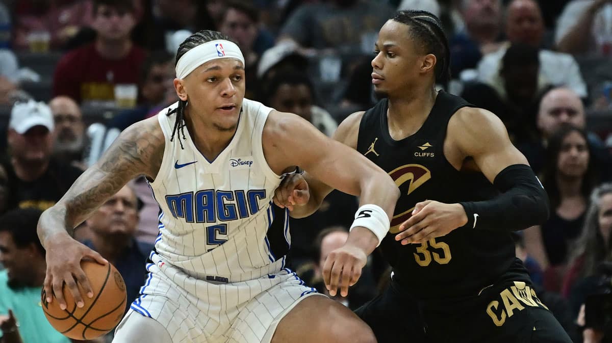 Cleveland Cavaliers forward Isaac Okoro (35) defends Orlando Magic forward Paolo Banchero (5) during the second half in game five of the first round for the 2024 NBA playoffs at Rocket Mortgage FieldHouse.
