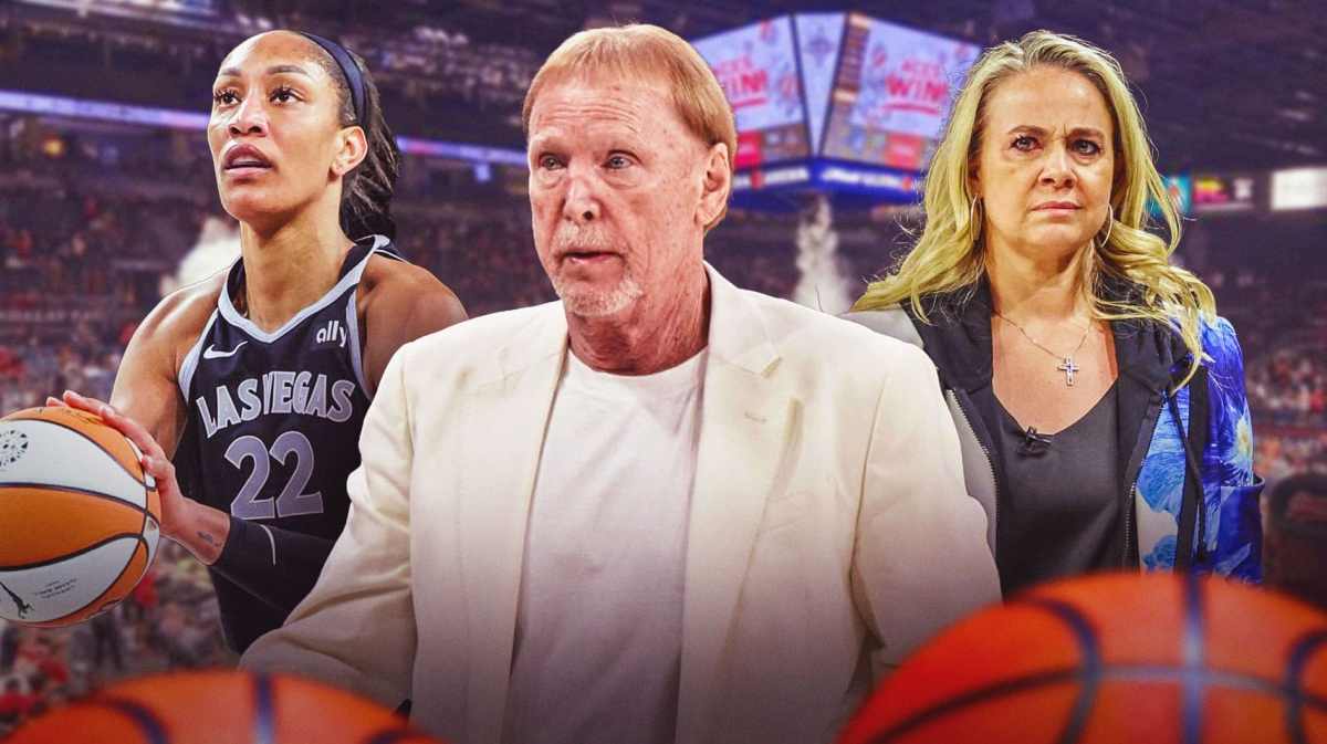 Las Vegas Aces coach Mark Davis, with Las Vegas Aces player A'ja Wilson and Las Vegas Aces coach Becky Hammon