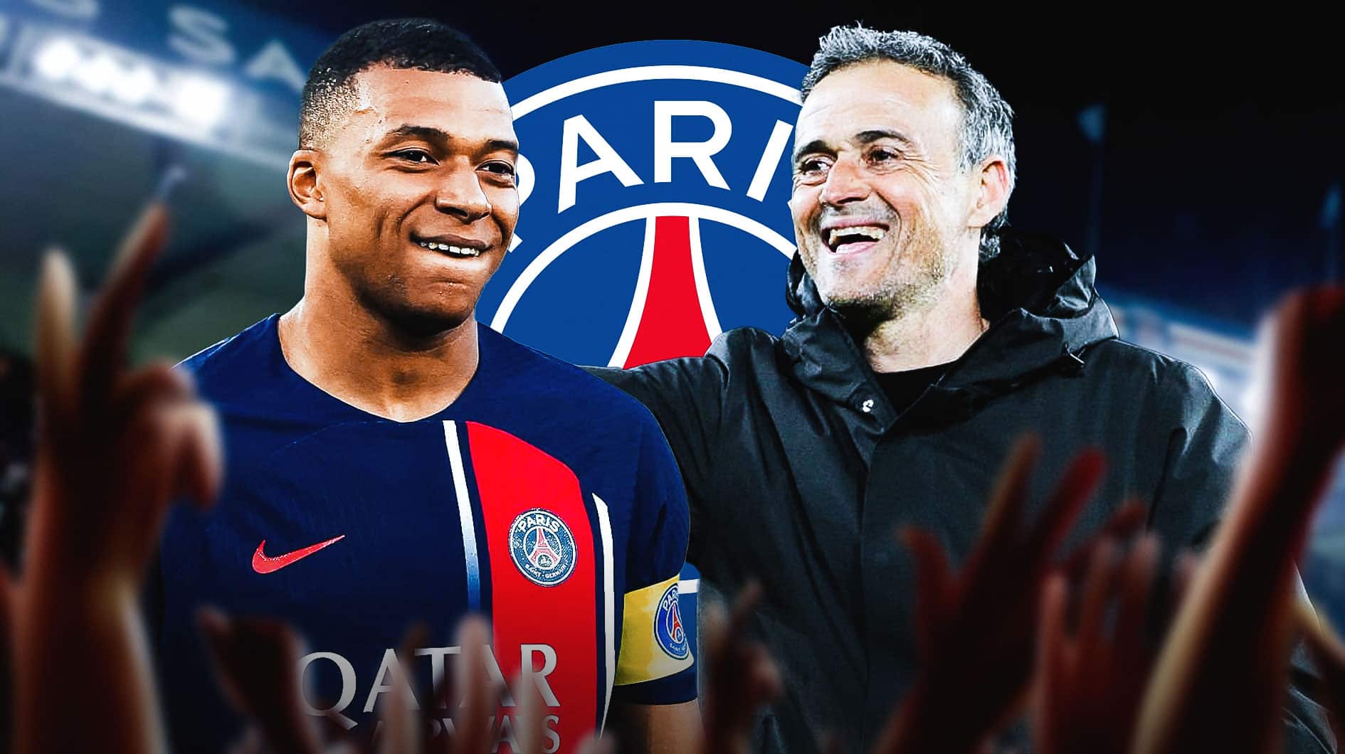Luis Enrique laughing next to Kylian Mbappe, the PSG logo behind them