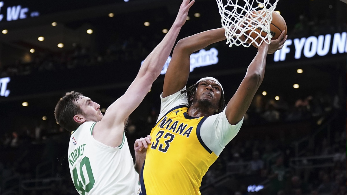 Indiana Pacers center Myles Turner (33) shoots the ball against Boston Celtics center Luke Kornet (40) in the second quarter during game one of the eastern conference finals for the 2024 NBA playoffs at TD Garden.