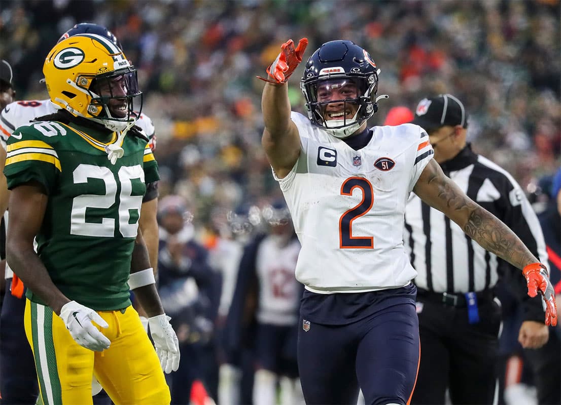 Chicago Bears wide receiver DJ Moore (2) signals for a first down after making a reception against the Green Bay Packers on Sunday, January 7, 2024, at Lambeau Field in Green Bay, Wis. The Packers won the game, 17-9, to clinch an NFC playoff berth.