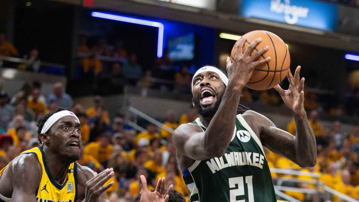 Milwaukee Bucks guard Patrick Beverley (21) shoots the ball while Indiana Pacers forward Pascal Siakam (43) defends