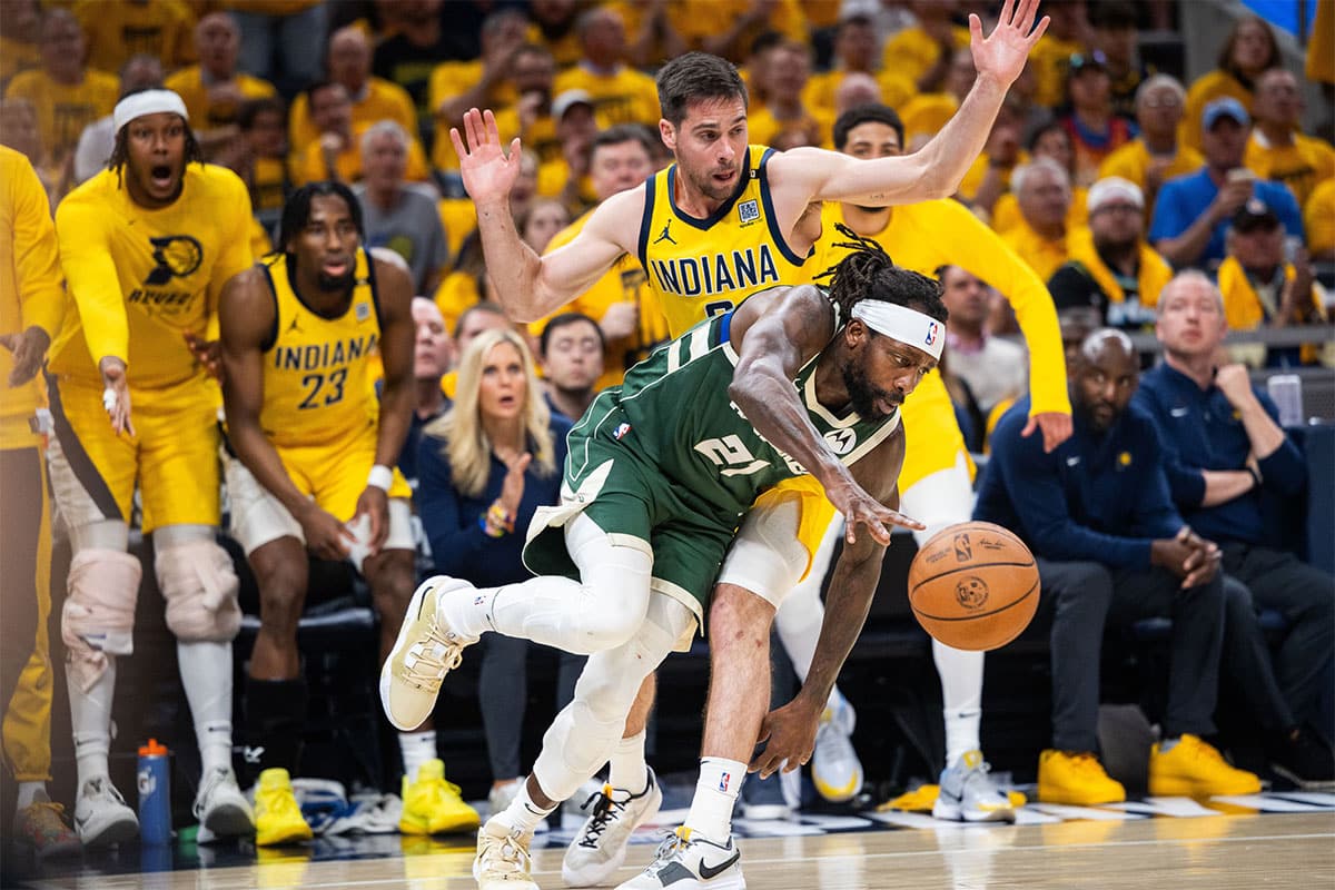 Milwaukee Bucks player Patrick Beverley and Indiana Pacers player T.J. McConnell