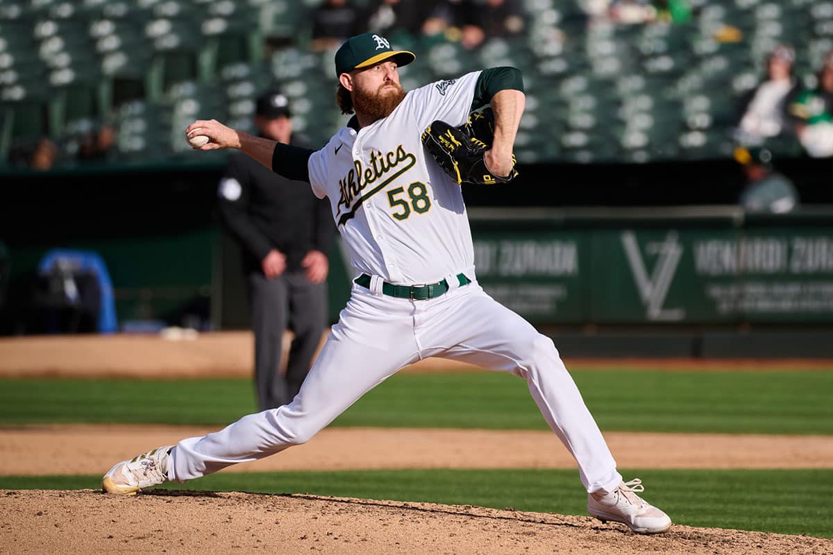Oakland Athletics starting pitcher Paul Blackburn (58) throws a pitch against the Miami Marlins during the sixth inning at Oakland-Alameda County Coliseum.