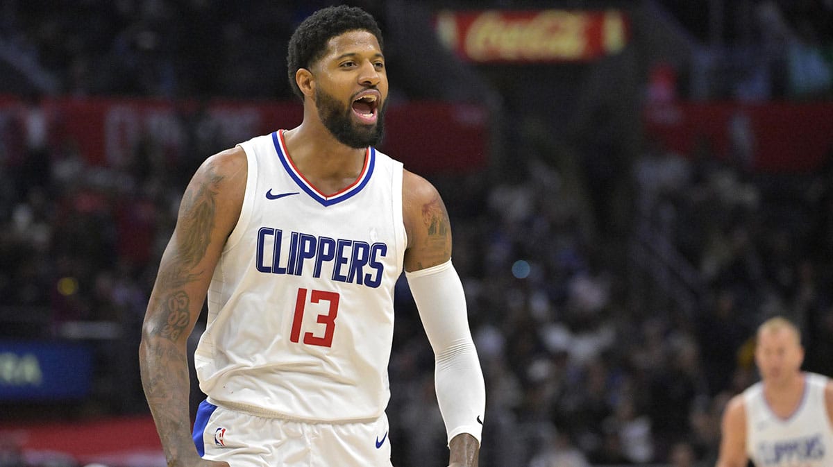 Los Angeles Clippers forward Paul George (13) celebrates after a three point basket in the fourth quarter against the Cleveland Cavaliers at Crypto.com Arena.