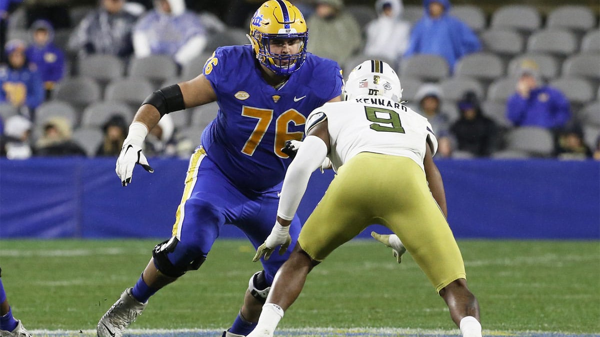 Pittsburgh Panthers offensive lineman Matt Goncalves (76) blocks at the line of scrimmage against Georgia Tech Yellow Jackets defensive lineman Kyle Kennard (9) during the second quarter at Acrisure Stadium.