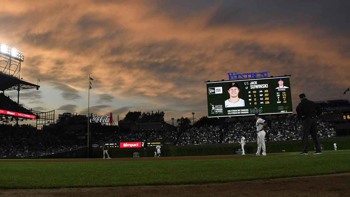 General view of a sunset over Wrigley Field during the sixth inning of the game between the Chicago Cubs and the Pittsburgh Pirates