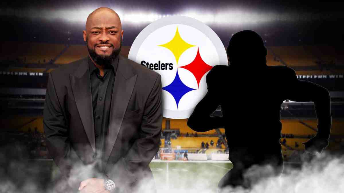 Mike Tomlin next to a silhouette