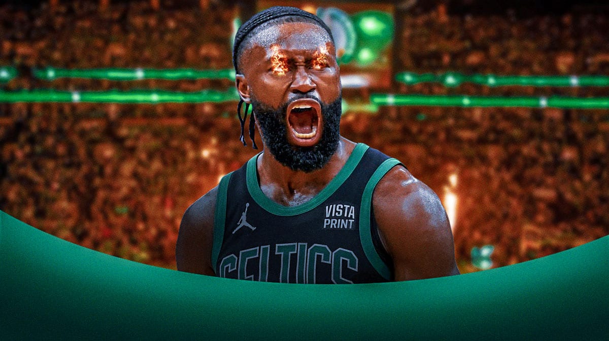 Jaylen Brown celebrating with fire in his eyes.
