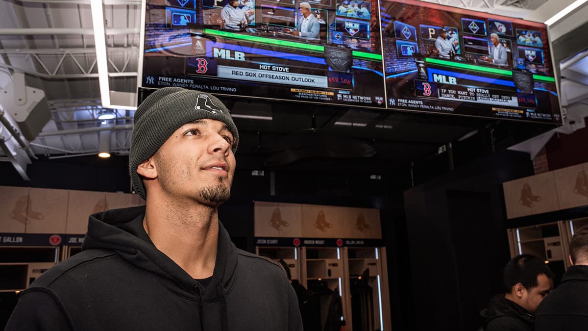New Red Sox second baseman Vaughn Grissom eyes an MLB Network report on TV during the Red Sox Rookie Development Program at Fenway Park on Wednesday.