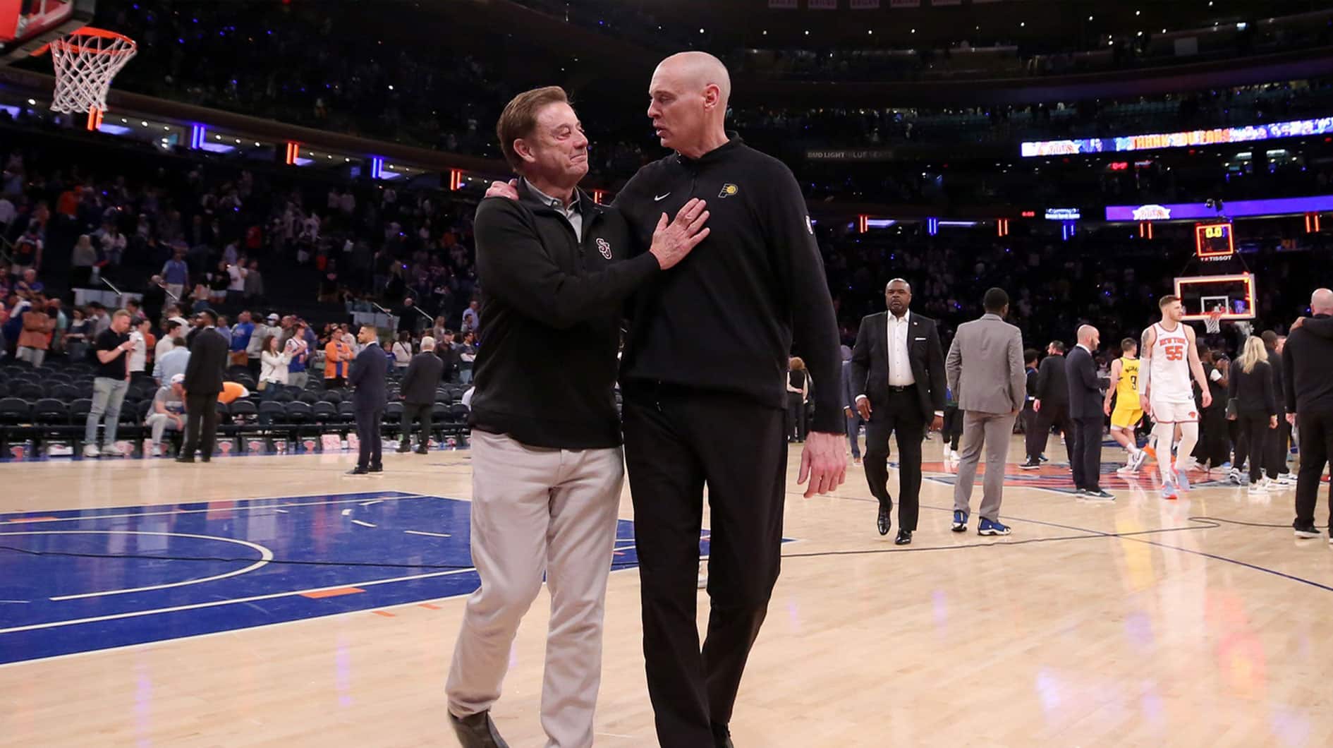 Indiana Pacers head coach Rick Carlisle (right) talks to St. John's Red Storm head coach Rick Pitino after defeating the New York Knicks in game seven of the second round of the 2024 NBA playoffs at Madison Square Garden.