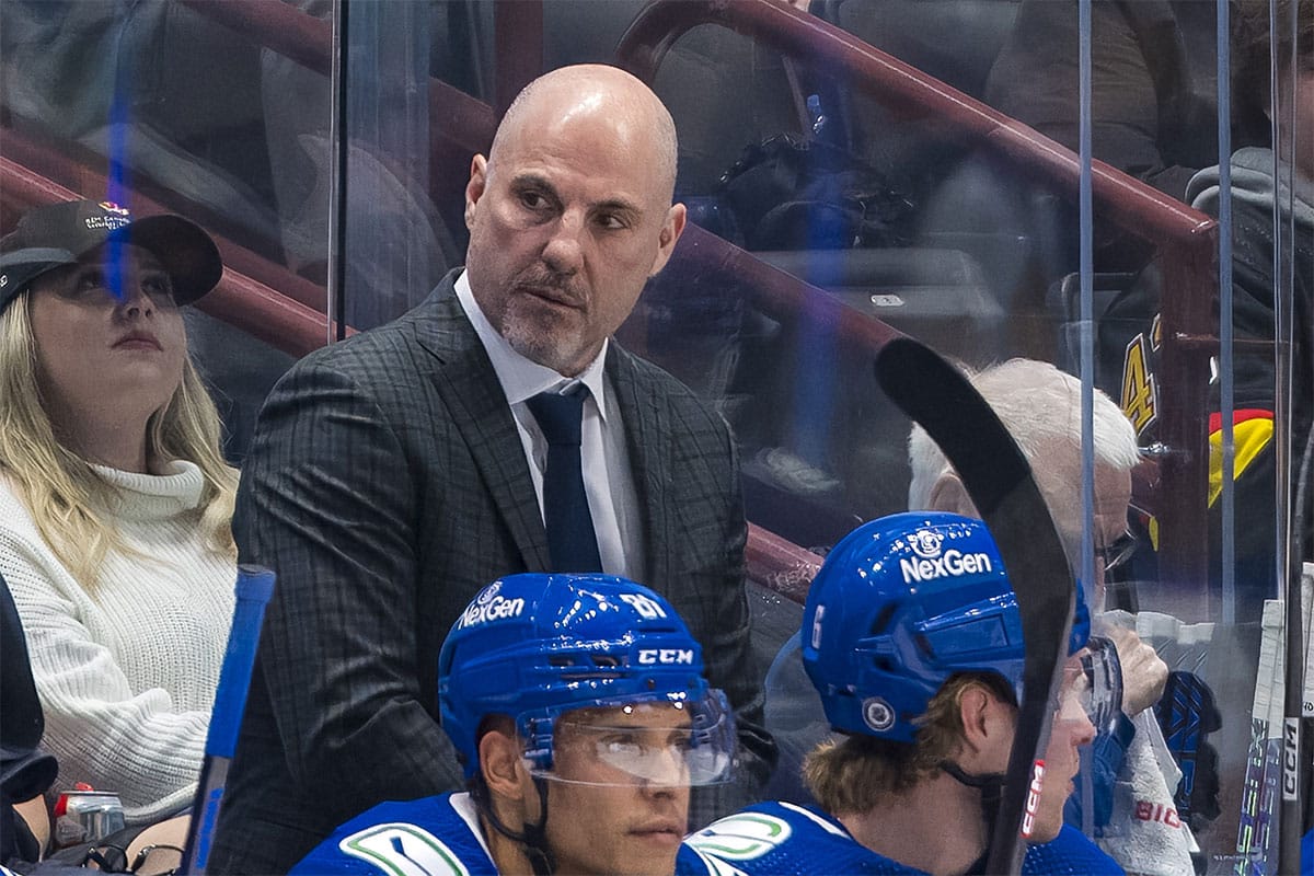  Vancouver Canucks head coach Rick Tocchet on the bench against the Calgary Flames in the first period at Rogers Arena.