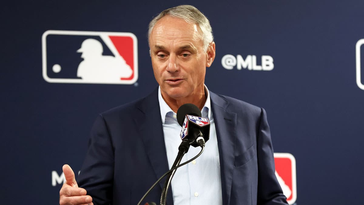 MLB commissioner Rob Manfred talks with media at George M. Steinbrenner Field.