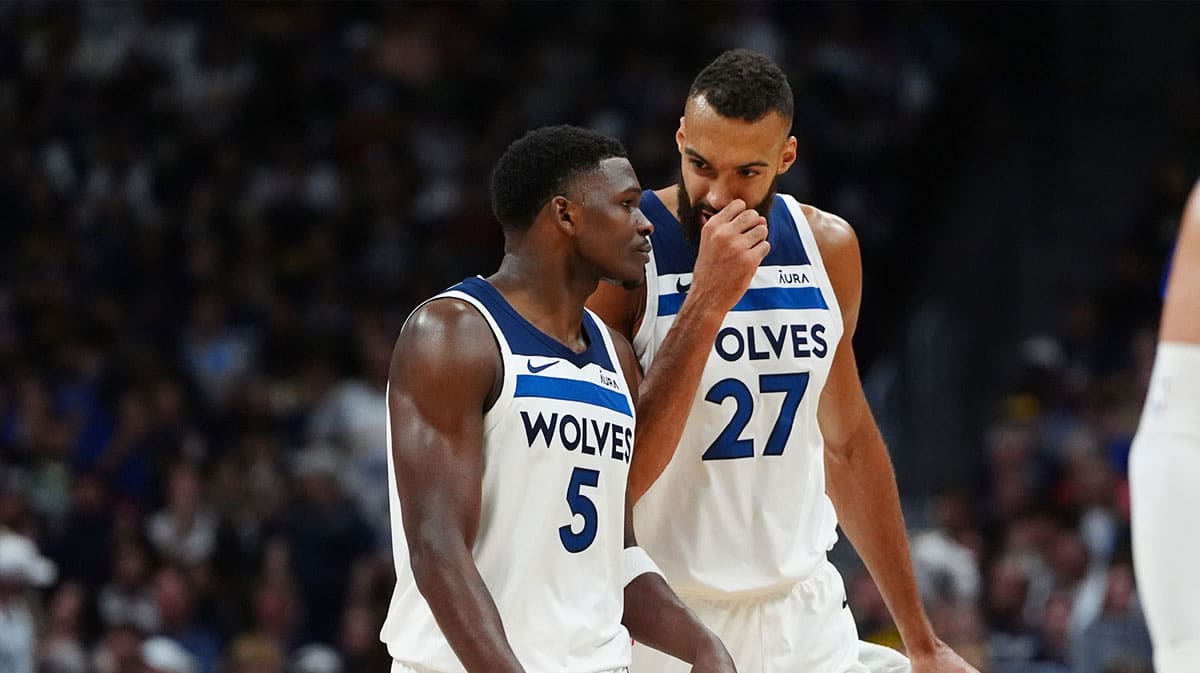 Minnesota Timberwolves guard Anthony Edwards (5) and center Rudy Gobert (27) during the second half against the Denver Nuggets during game one of the second round for the 2024 NBA playoffs at Ball Arena.