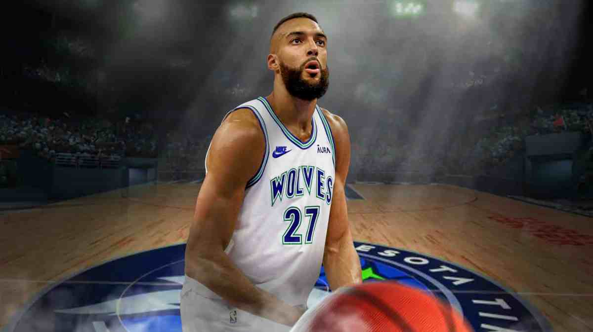 Timberwolves center Rudy Gobert with spotlight on him, Target Center in back