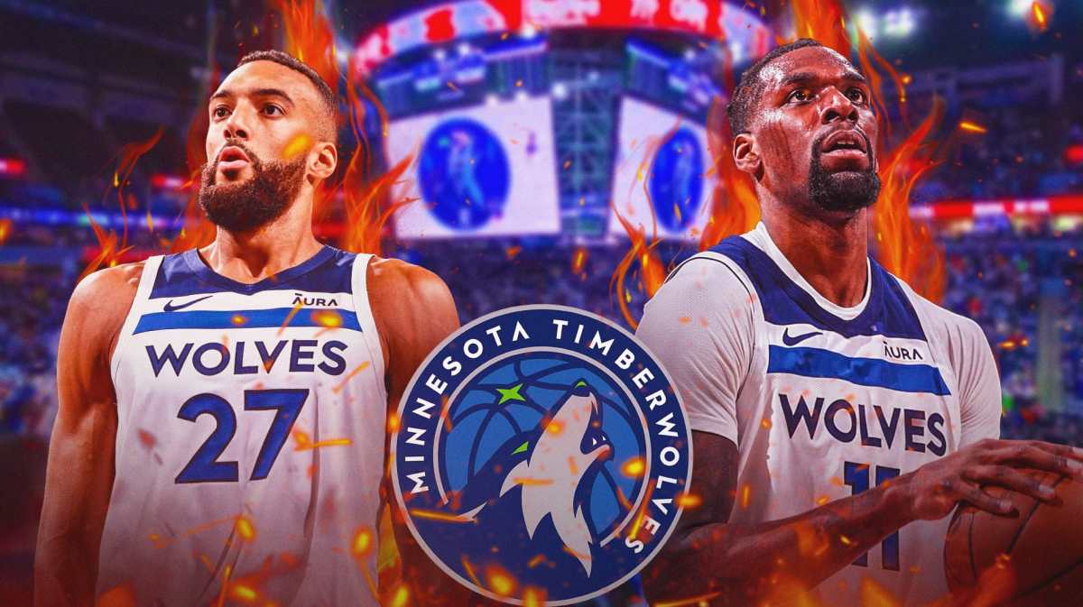 Timberwolves' Rudy Gobert and Naz Reid stand at free throw line during Game 1 of NBA Playoffs vs Nuggets