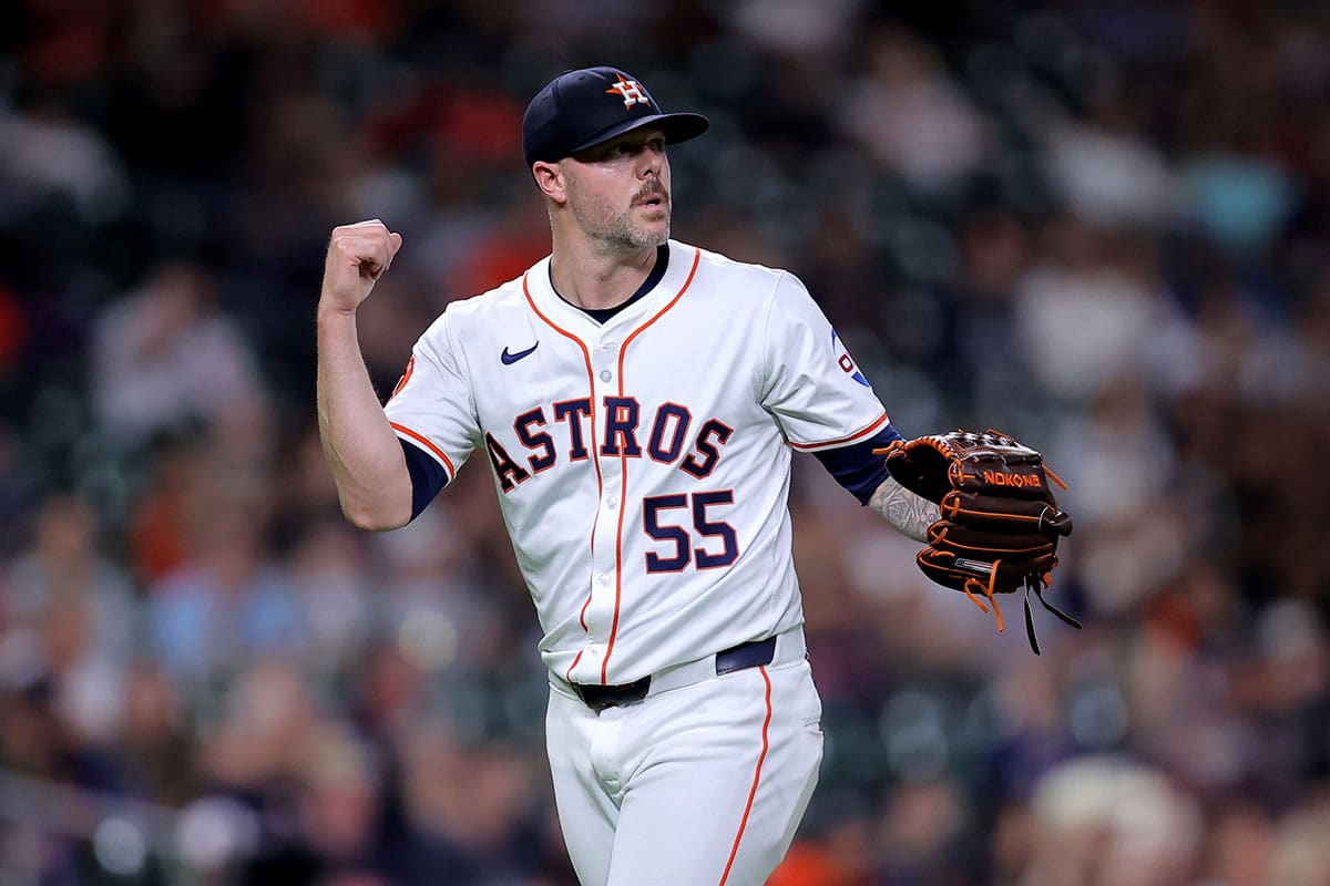 Houston Astros relief pitcher Ryan Pressly (55) reacts after retiring the side against the Cleveland Guardians during the eighth inning at Minute Maid Park.