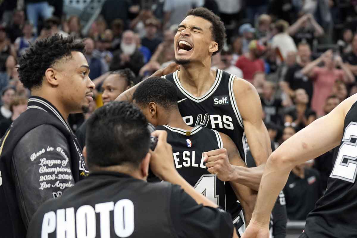 Apr 12, 2024; San Antonio, Texas, USA; San Antonio Spurs forward Victor Wembanyama (1) and teammates react after a victory over the Denver Nuggets at Frost Bank Center. Mandatory Credit: Scott Wachter-USA TODAY Sports