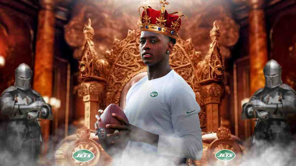 Sauce Gardner sits on a throne with a crown.