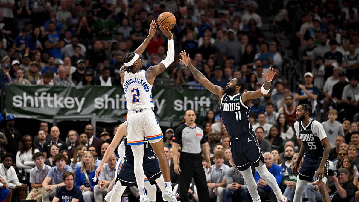 Oklahoma City Thunder guard Shai Gilgeous-Alexander (2) makes a jump shot over Dallas Mavericks guard Kyrie Irving (11) during the second half in game four of the second round for the 2024 NBA playoffs at American Airlines Center.